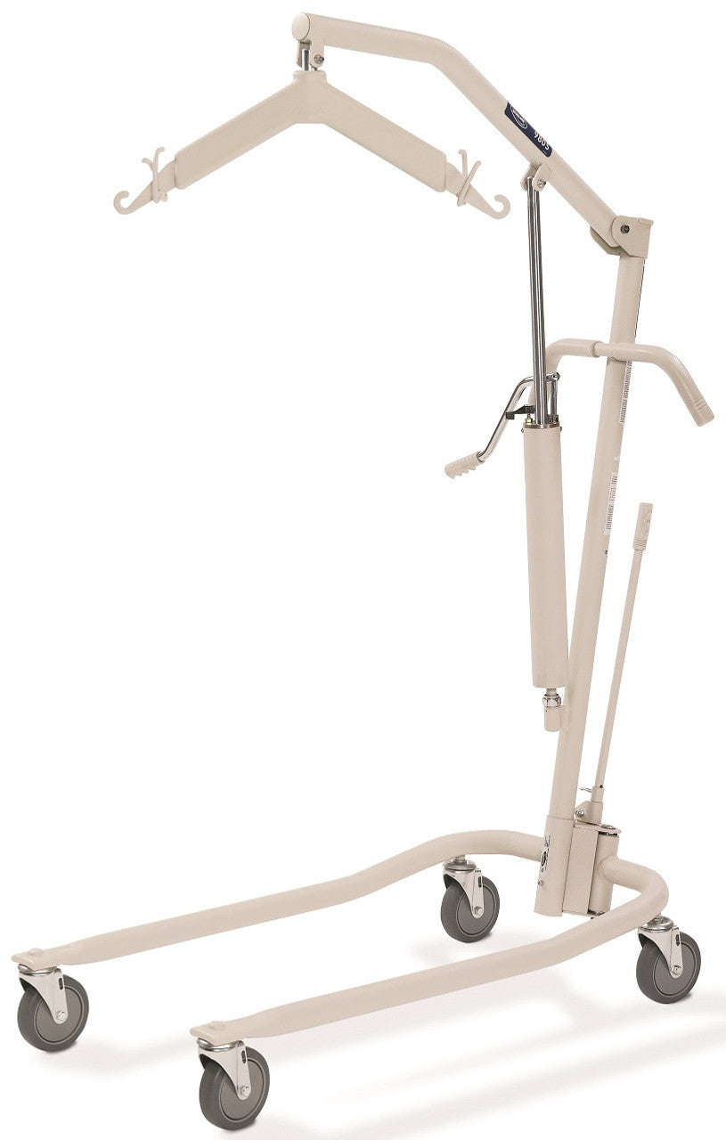 Invacare hydraulic patient lift with manual pump, padded six-point swivel bar, steel frame, and lifting boom for safe patient transfers.