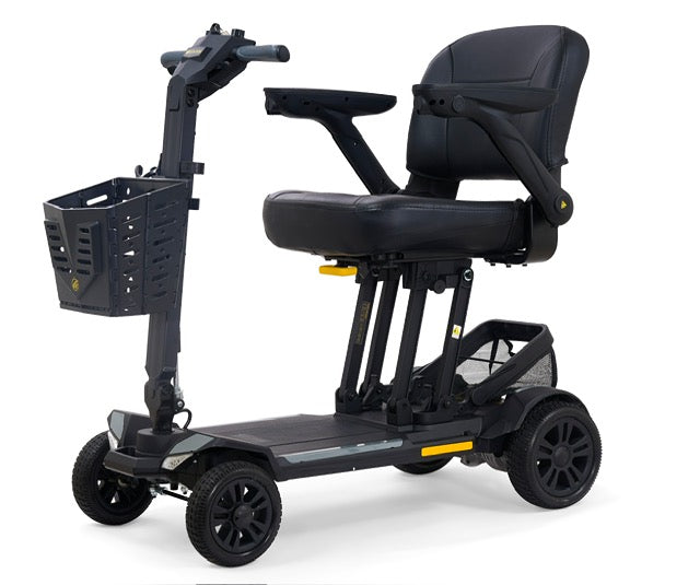 Golden Technologies Buzzaround CarryOn HD portable mobility scooter in black with red accents, front basket, padded swivel seat, adjustable armrests, and four-wheel base.